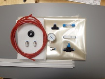 The contents of a pnuematic vacuum press kit